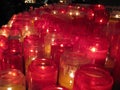 Warm and inviting red prayer candles inside the SacrÃÂ©-CÃâur, Paris Royalty Free Stock Photo